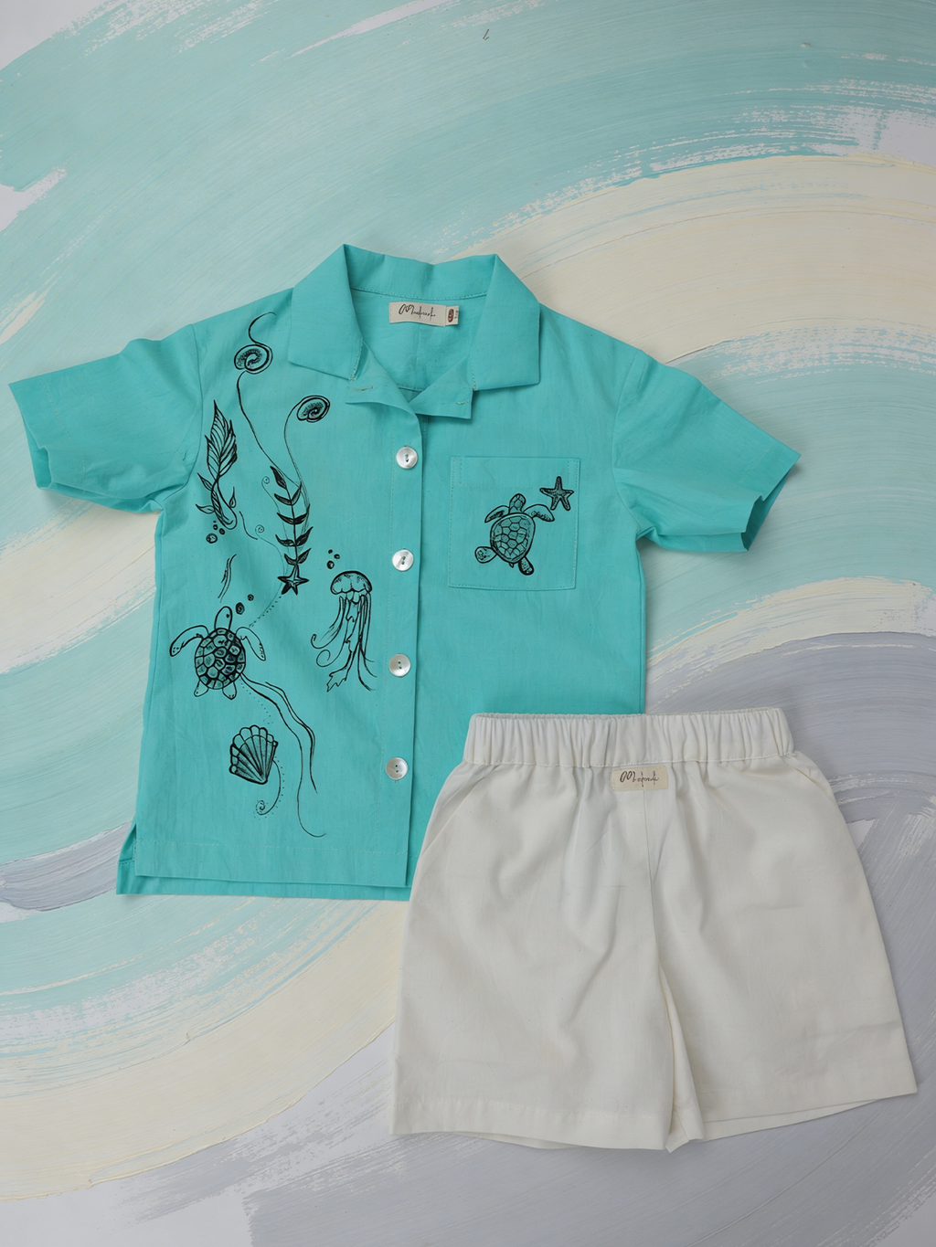 Aqua green shirt with white shorts