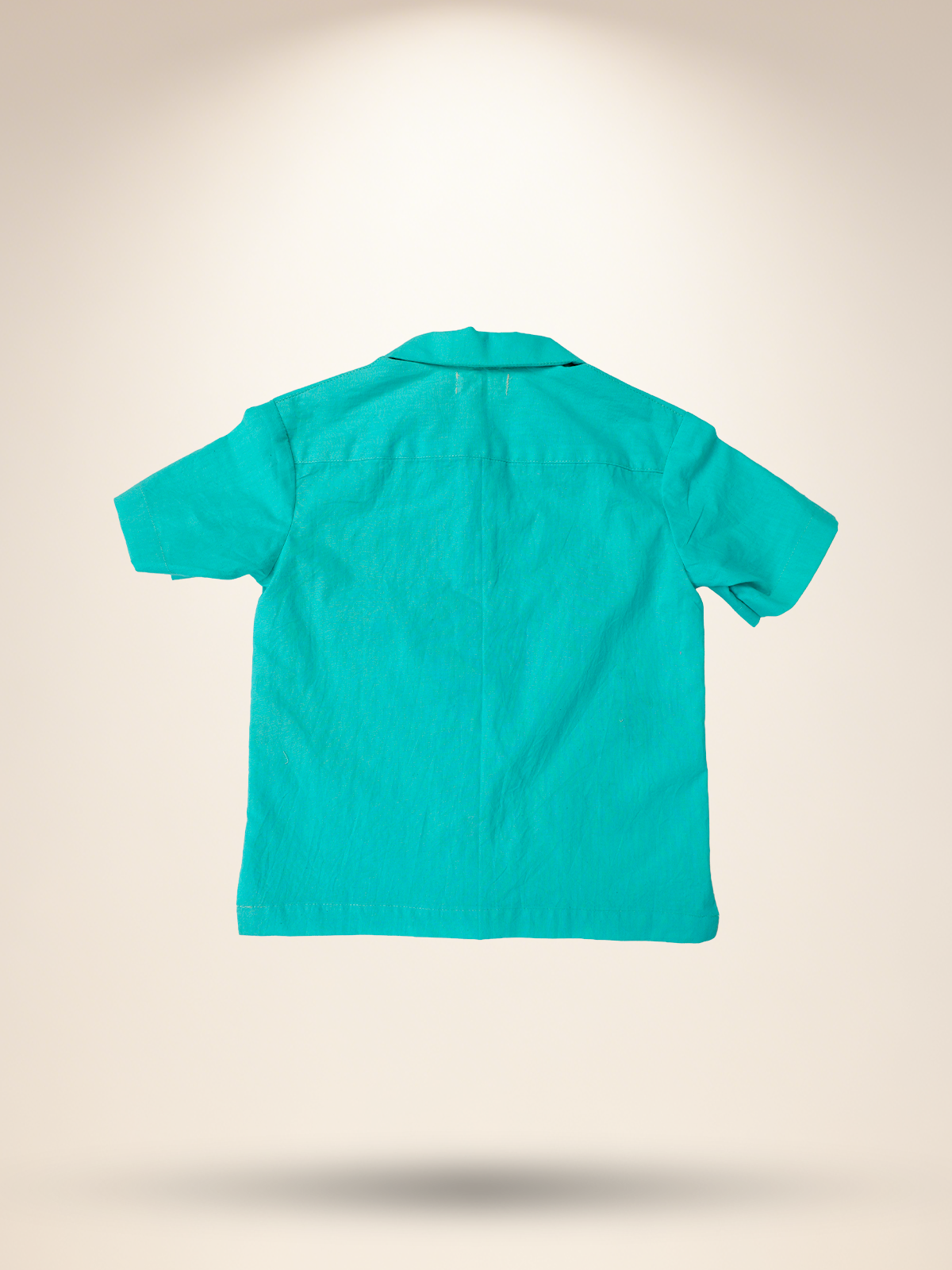 Aqua green shirt with white shorts