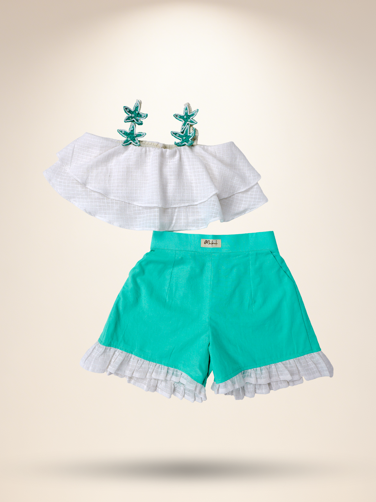 White umbrella top with aqua green shorts