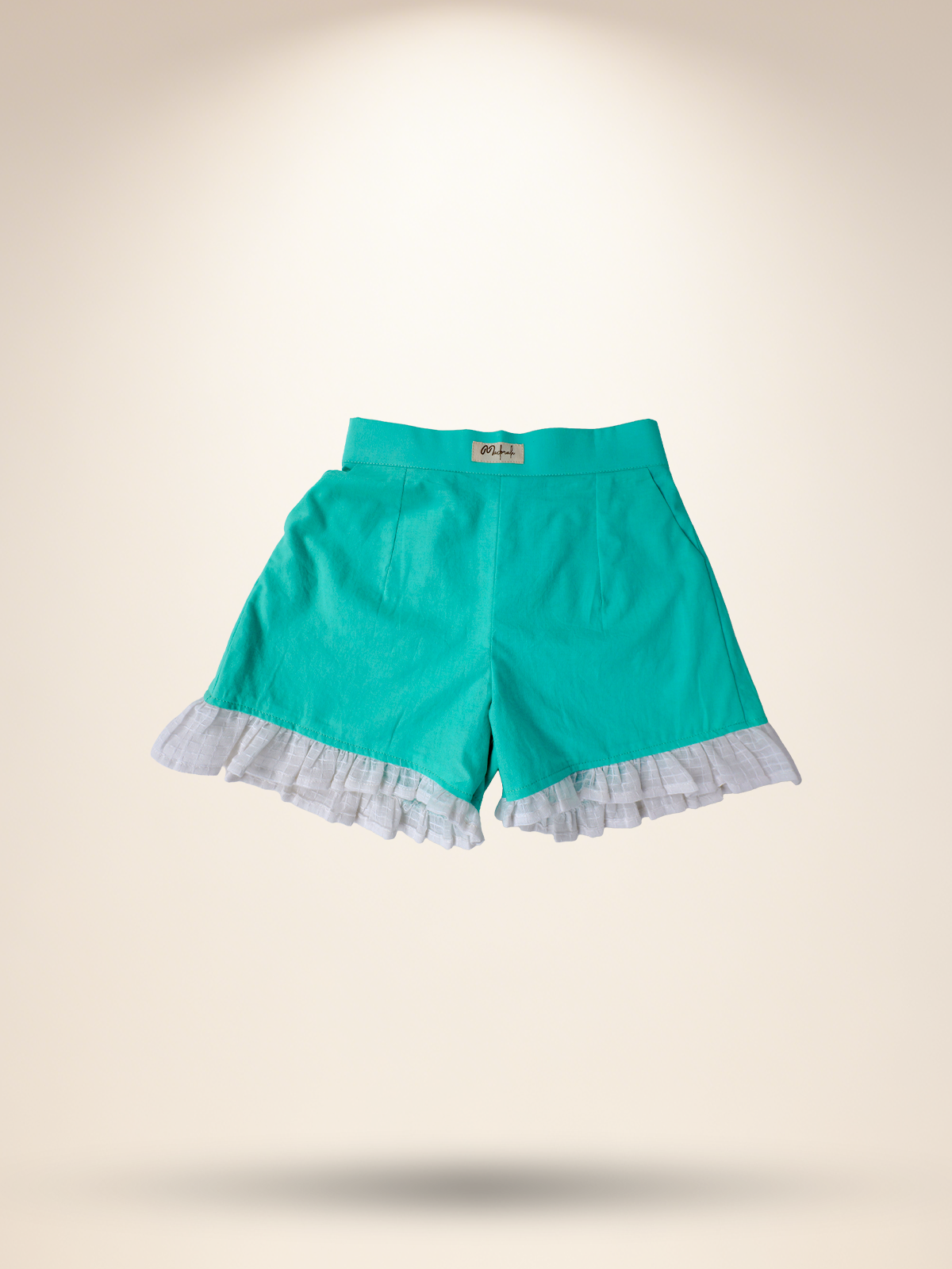 White umbrella top with aqua green shorts